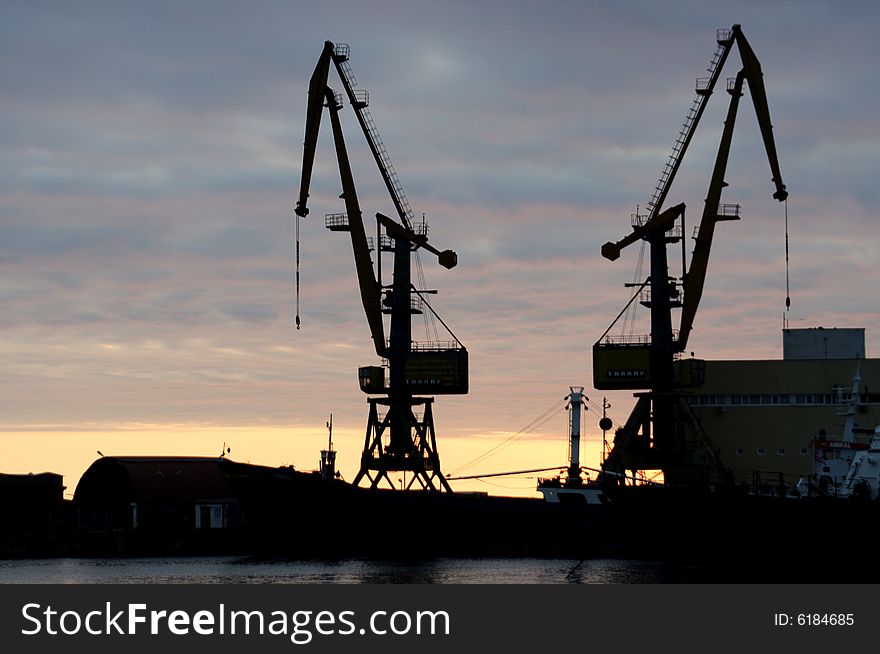 Loading taps in seaports at night. Loading taps in seaports at night