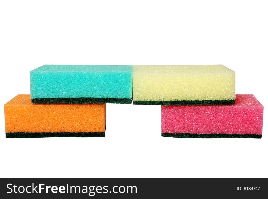 Four multicolor sponges. isolated on white