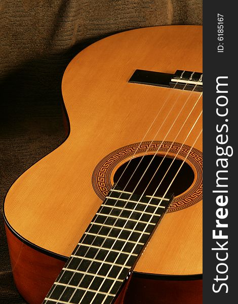 Classical guitar on retro background. Classical guitar on retro background