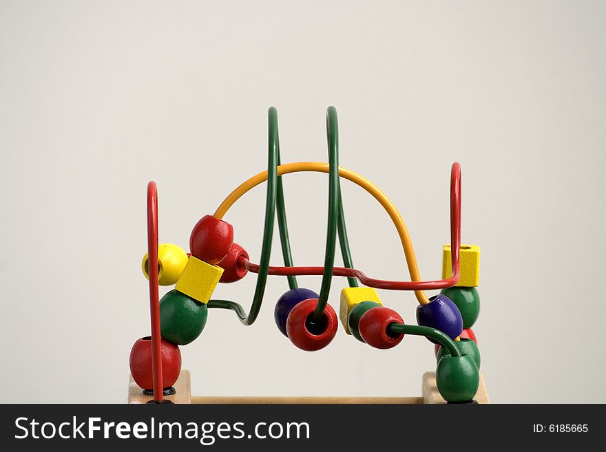 A colourful toy on white background. A colourful toy on white background.