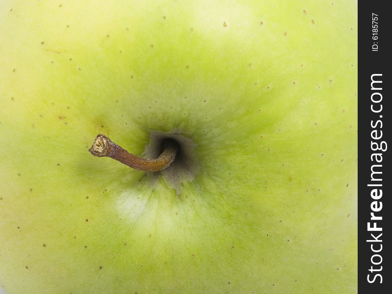 Nice fresh green closeup apple with tail. Nice fresh green closeup apple with tail