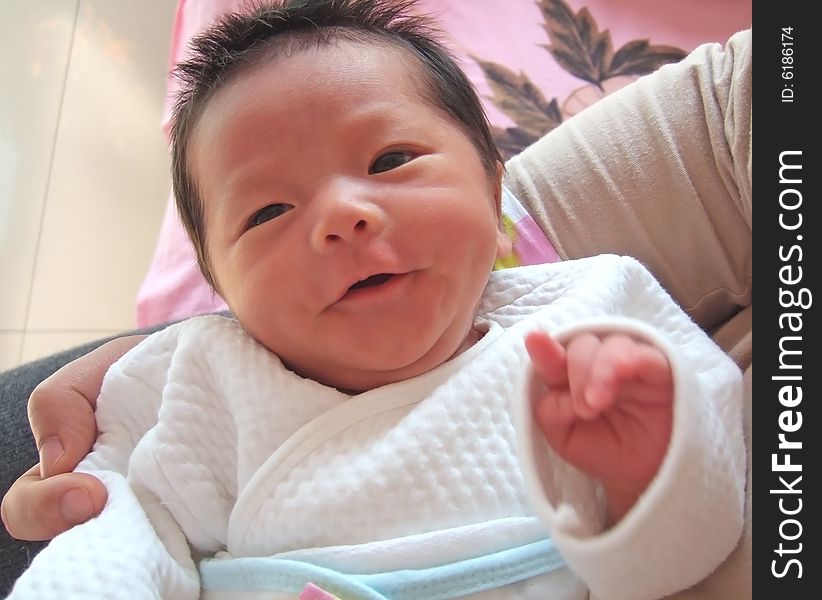 Cute baby on a bed