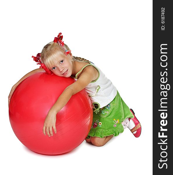 The girl with a greater red ball on a white background. The girl with a greater red ball on a white background