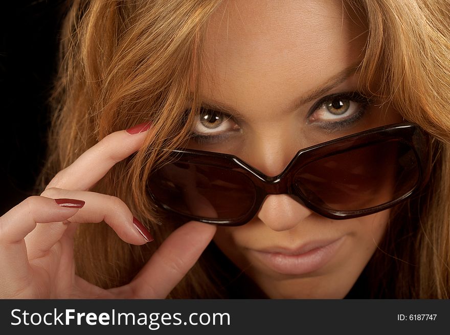 Beautiful Blond portrait of a woman with sunglasses. Beautiful Blond portrait of a woman with sunglasses