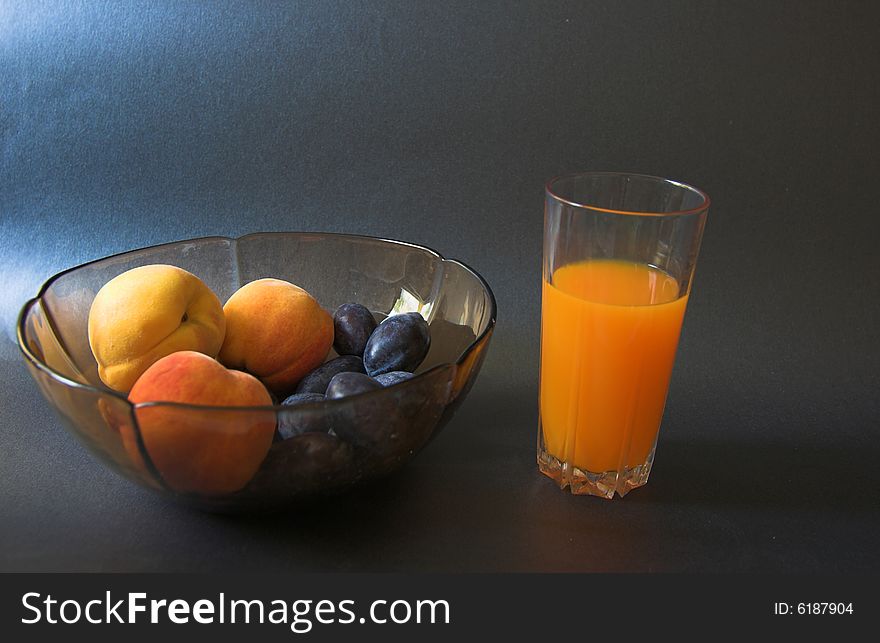 Fresh fruits and juice close up