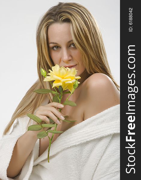 Woman Wearing Bathrobe With Yellow Flower