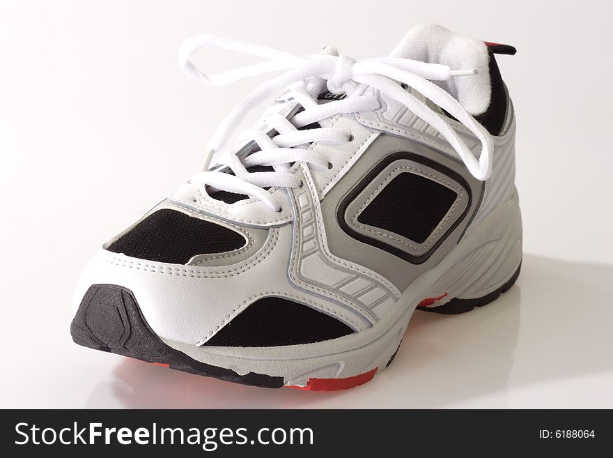 Sports shoe on bright background. Sports shoe on bright background