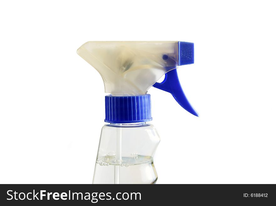 Spray bottle in detail on white background