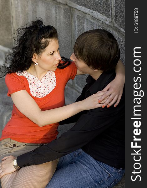 Outdoor portrait of young attractive couple together