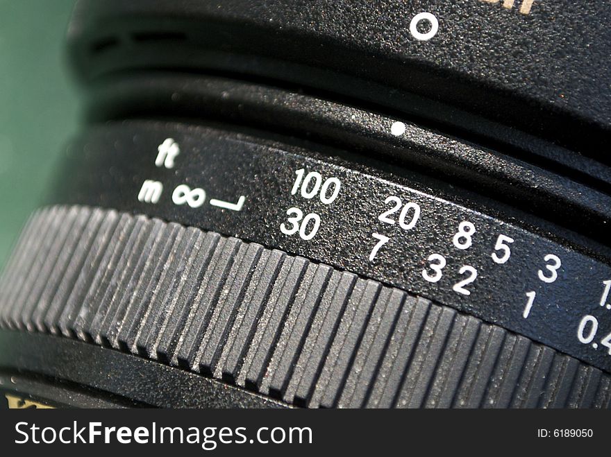 Macro shot of focal length settings on lens, selective focus