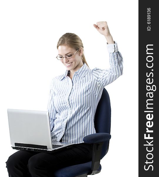 Portrait of a young attractive professional Caucasian female working on a laptop. Portrait of a young attractive professional Caucasian female working on a laptop.