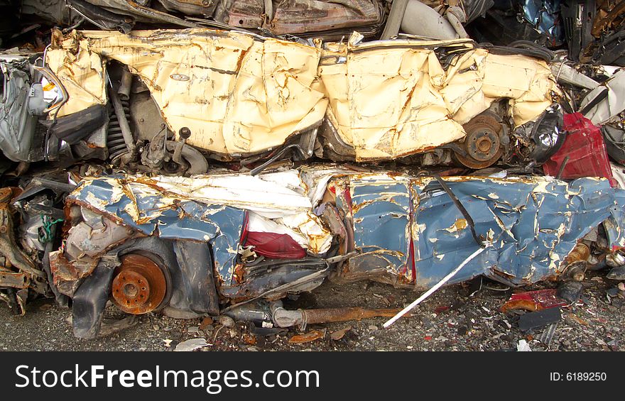 Pile of pressed cars in Tromsoe, norwegian arctic region. Pile of pressed cars in Tromsoe, norwegian arctic region