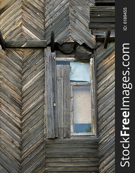 Old wooden wall with window. Abstract texture.