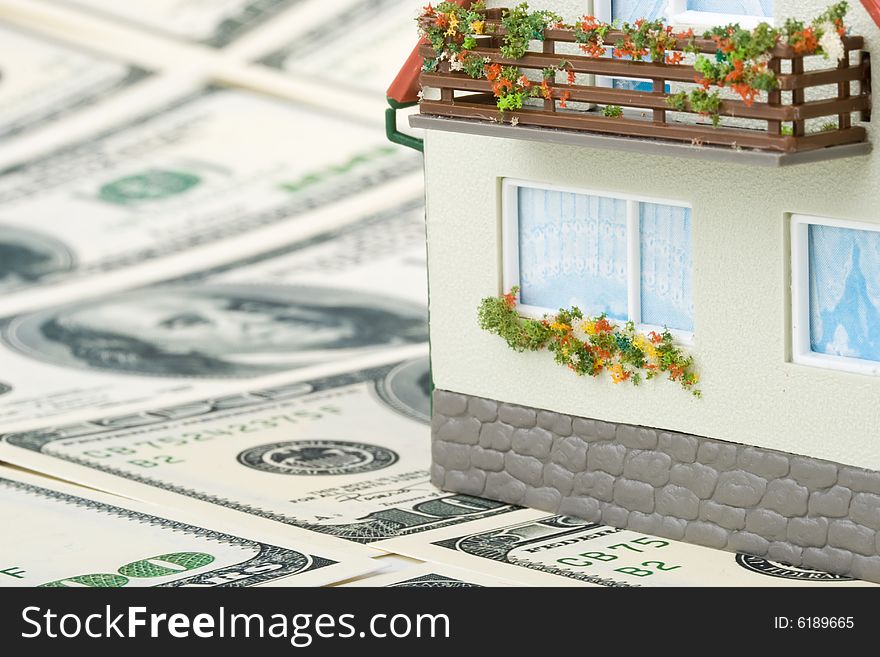 Miniature House and Money.
Buying house concept