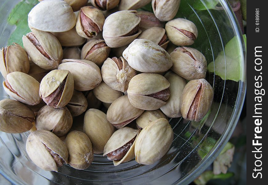 Pistachios in the vase ready for being eaten.