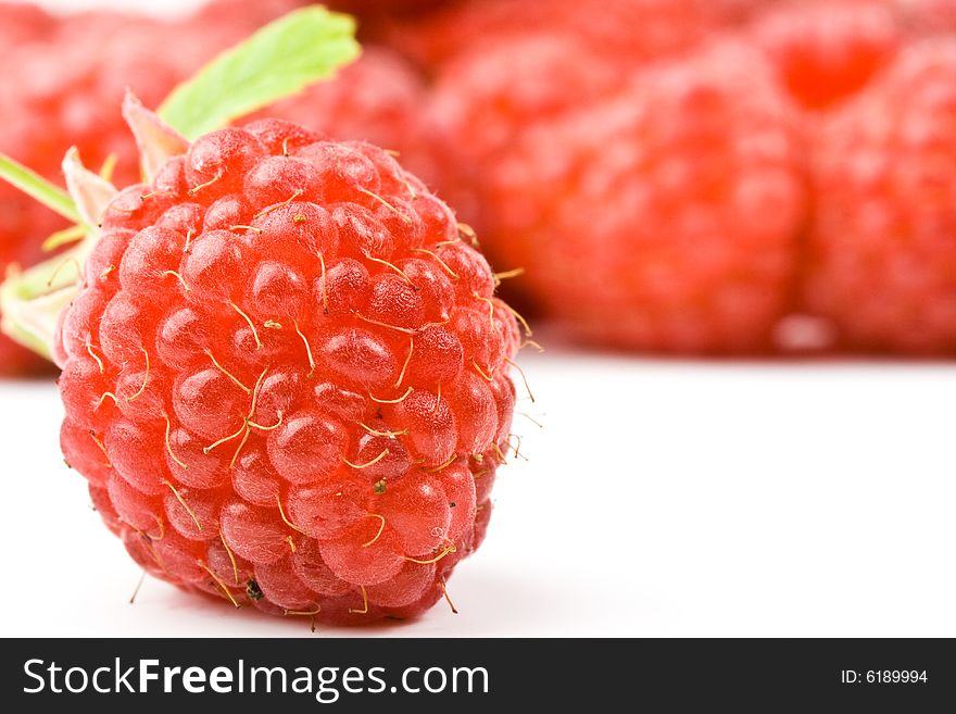 Fresh ripe raspberry on a white background. Fresh ripe raspberry on a white background