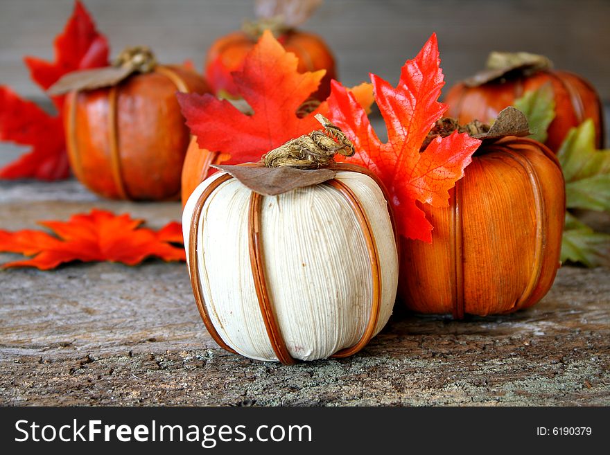 A pumpkin and fall leaf center piece for the holidays. A pumpkin and fall leaf center piece for the holidays.
