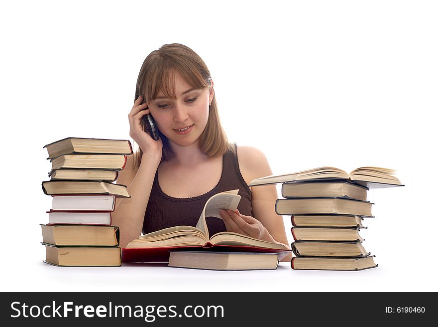 The young woman and a pile of books