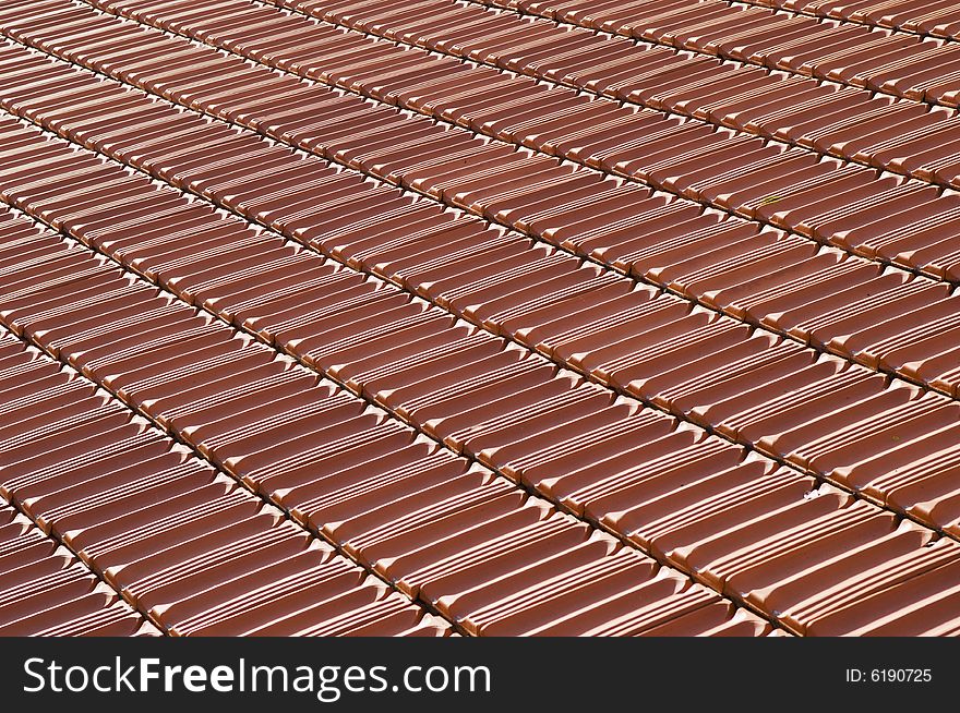 Tiled roof with repeating patterns for background or texture. Tiled roof with repeating patterns for background or texture