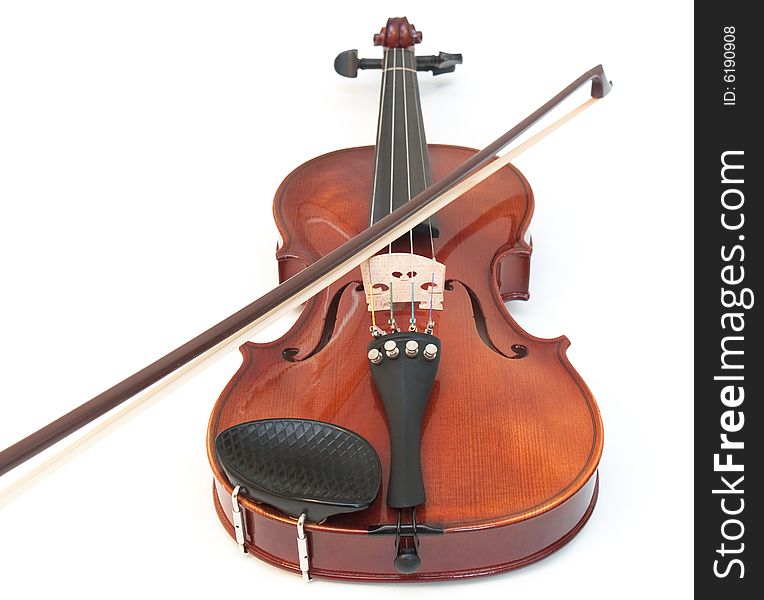 Violin and a bow, isolated on a white background. Violin and a bow, isolated on a white background.