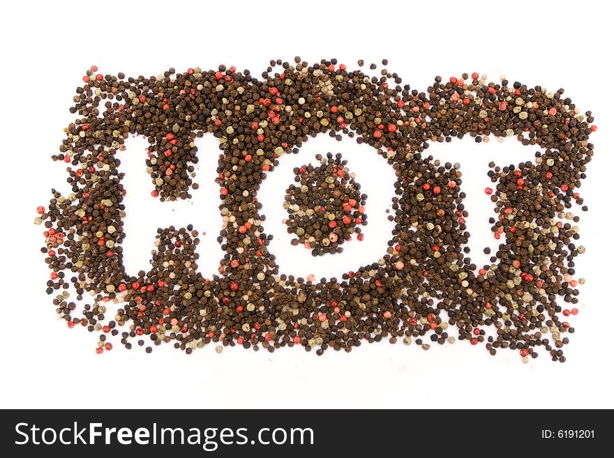 A lot of mixed pepper seasoning in a horizontal background image.