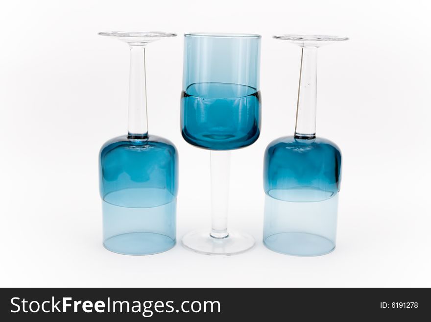 Turquoise glasses on a white background