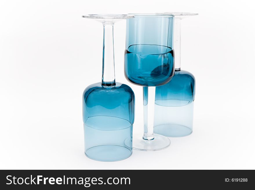 Turquoise glasses on a white background