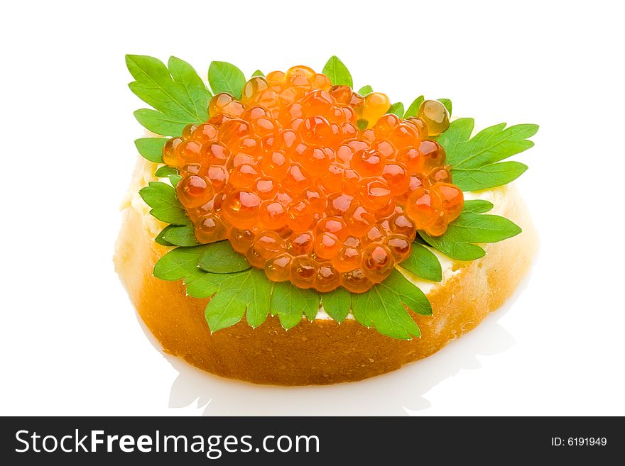 Isolated sandwich with red salmon caviar