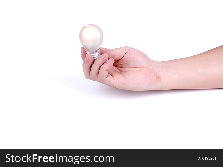 Light bulb in hand, isolated on white background