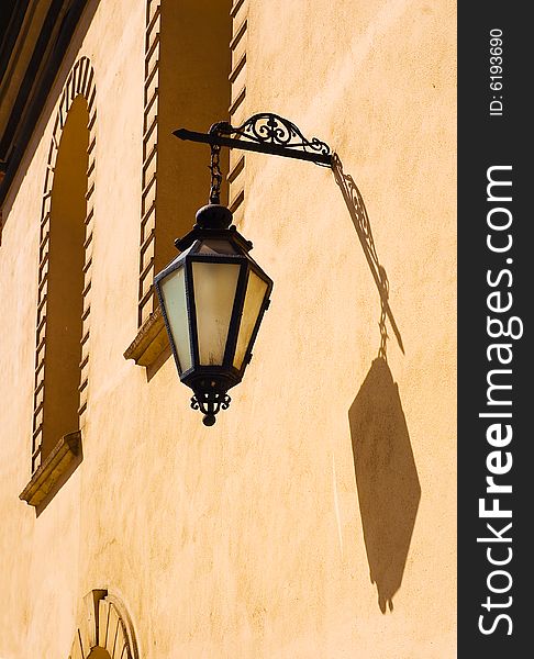 Poland ancient street lamp on the wall