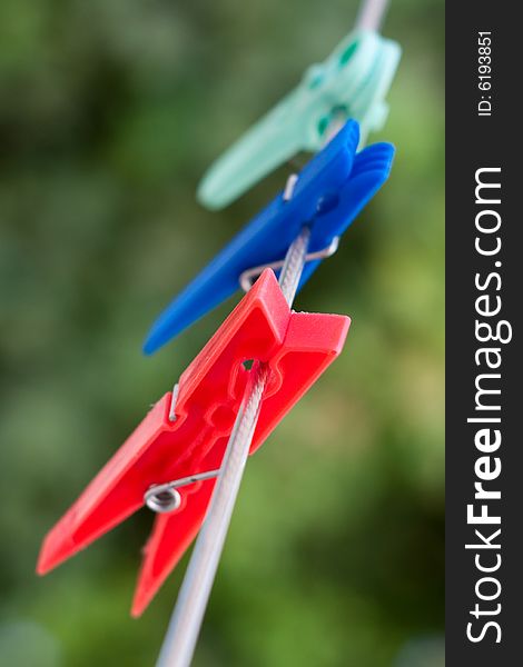 Laundry stave plastic colored clothespin