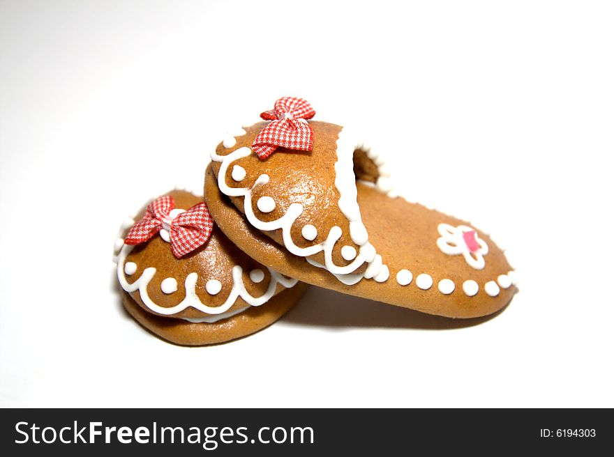 Decorated gingerbread shoes with little red bows