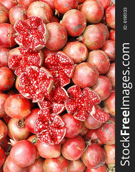 Group of pomegranates in market