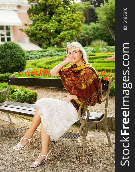 Young beautiful woman relaxing in a park