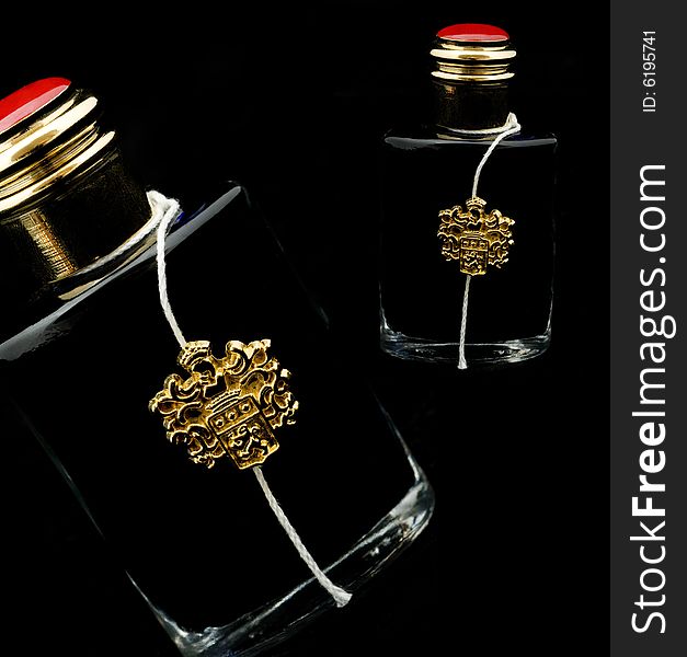 Two bottle ink on a black background
