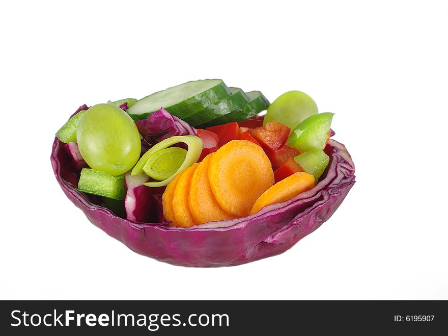 Different vegetables in cabbage on white background. Different vegetables in cabbage on white background