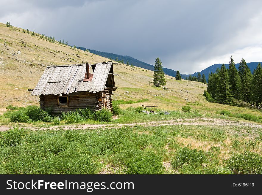 Deserted wood house in mountains. Deserted wood house in mountains