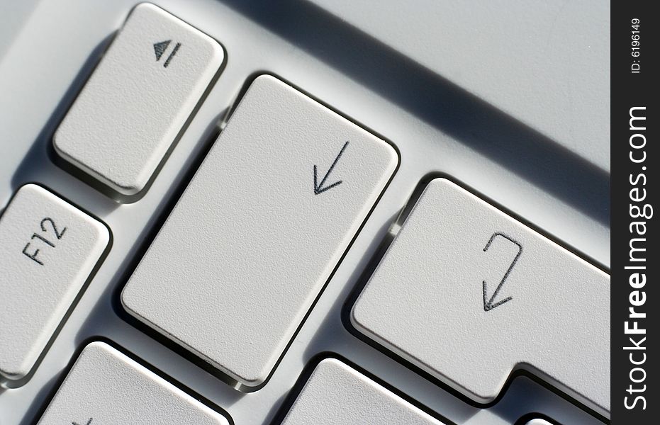 Close-up view of arrow keys on computer laptop