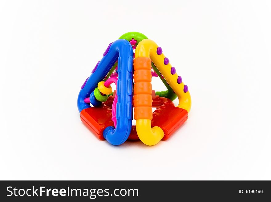 Colored plastic baby toy on a white background