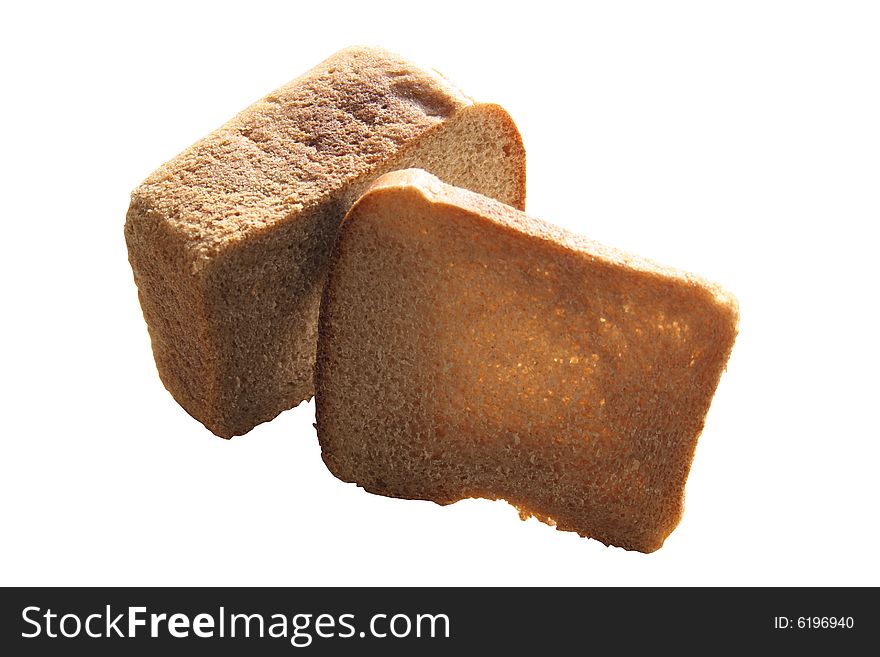 Loaf of rye-bread and bread slice on white background. Loaf of rye-bread and bread slice on white background