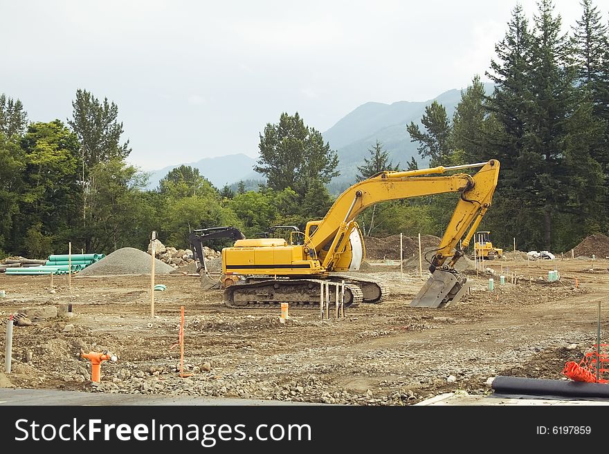 A front-end loader rests on the weekend at a Washington construction site. A front-end loader rests on the weekend at a Washington construction site.