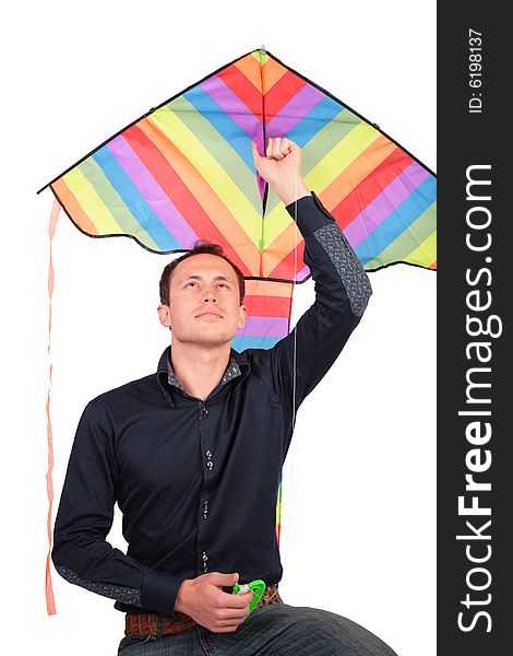 Man Holds Kite Above Head