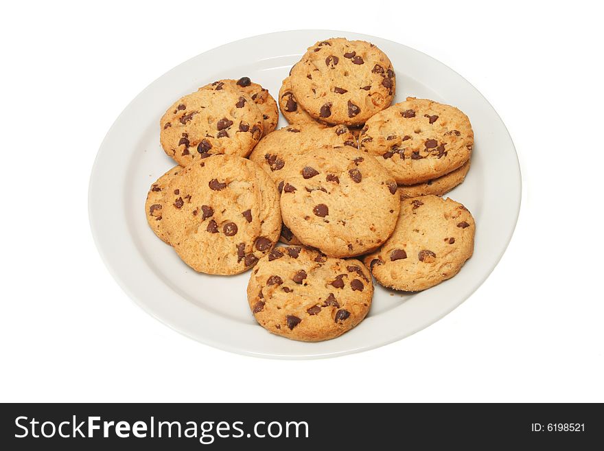 Chocolate chip cookies on a white plate. Chocolate chip cookies on a white plate