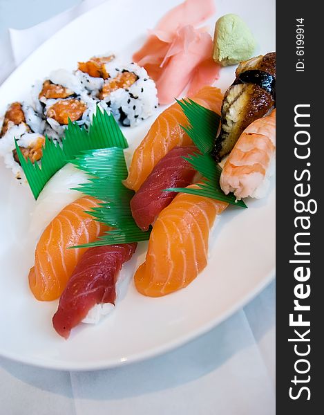 Classic Japanese meal - sushi with different kinds of fresh fish: salmon, tuna etc