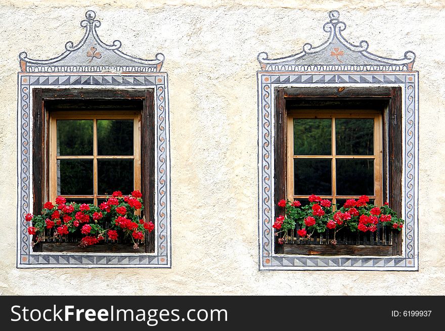 Windows on an antique house in Italy, detail. Windows on an antique house in Italy, detail