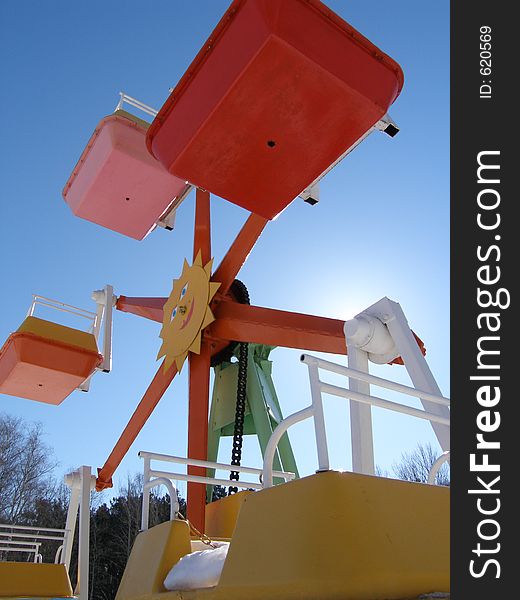 Children ferris wheel in winter