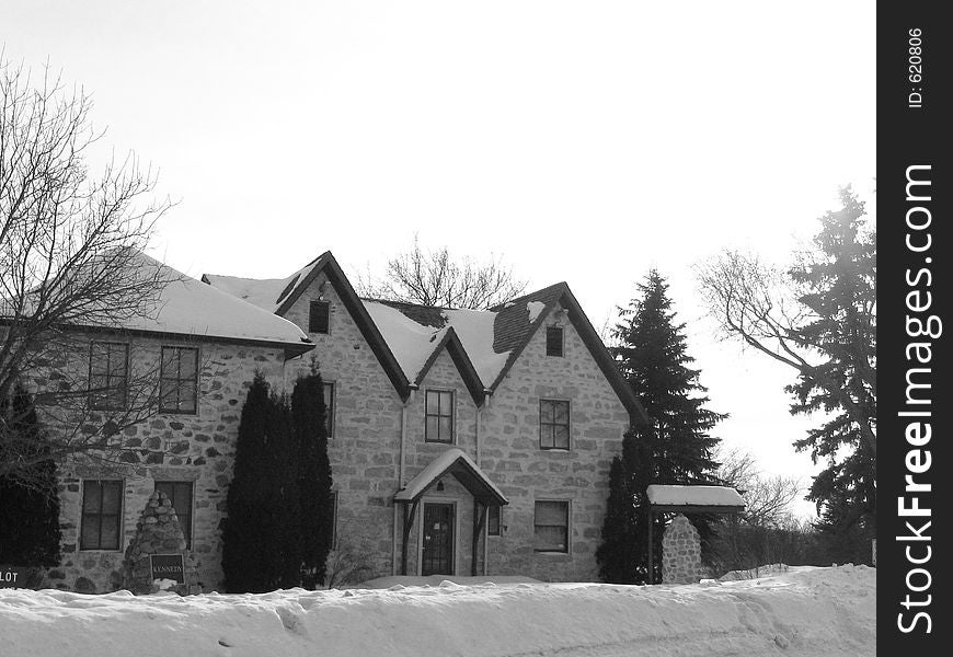 This image depicts an old stone mansion.