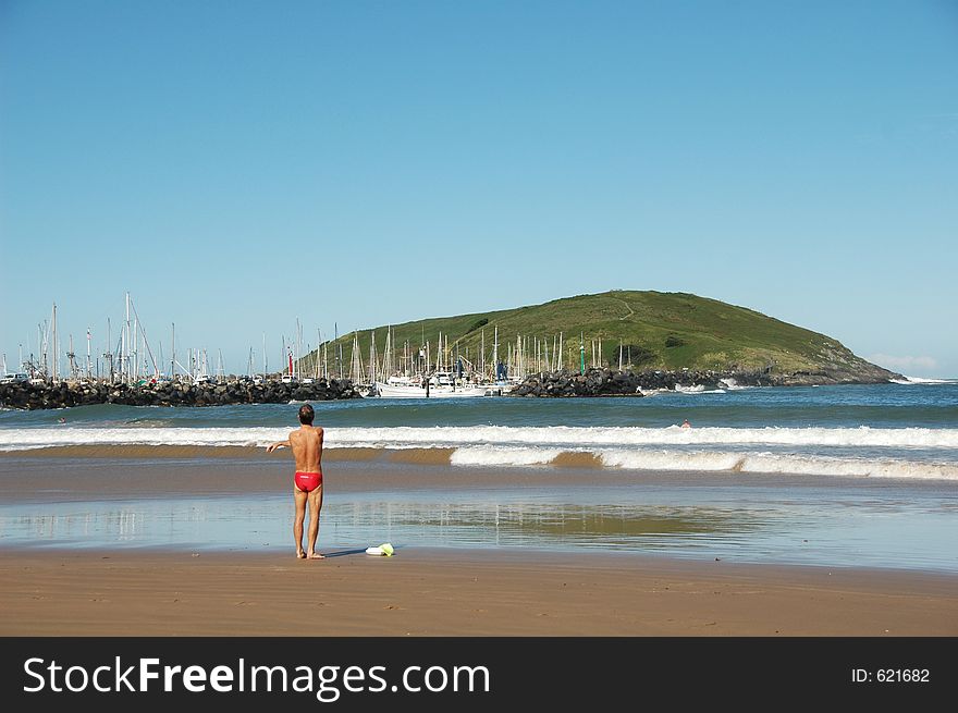 Man Exercising On The Beach