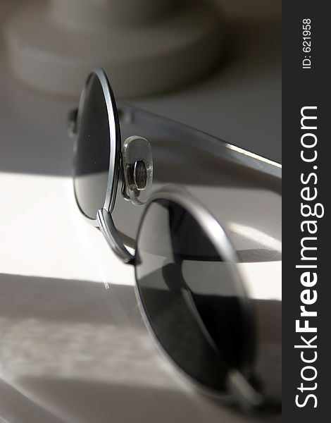 Sunglasses On Table In Sunlight