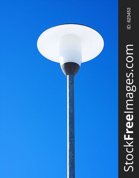 Streetlight on blue sky